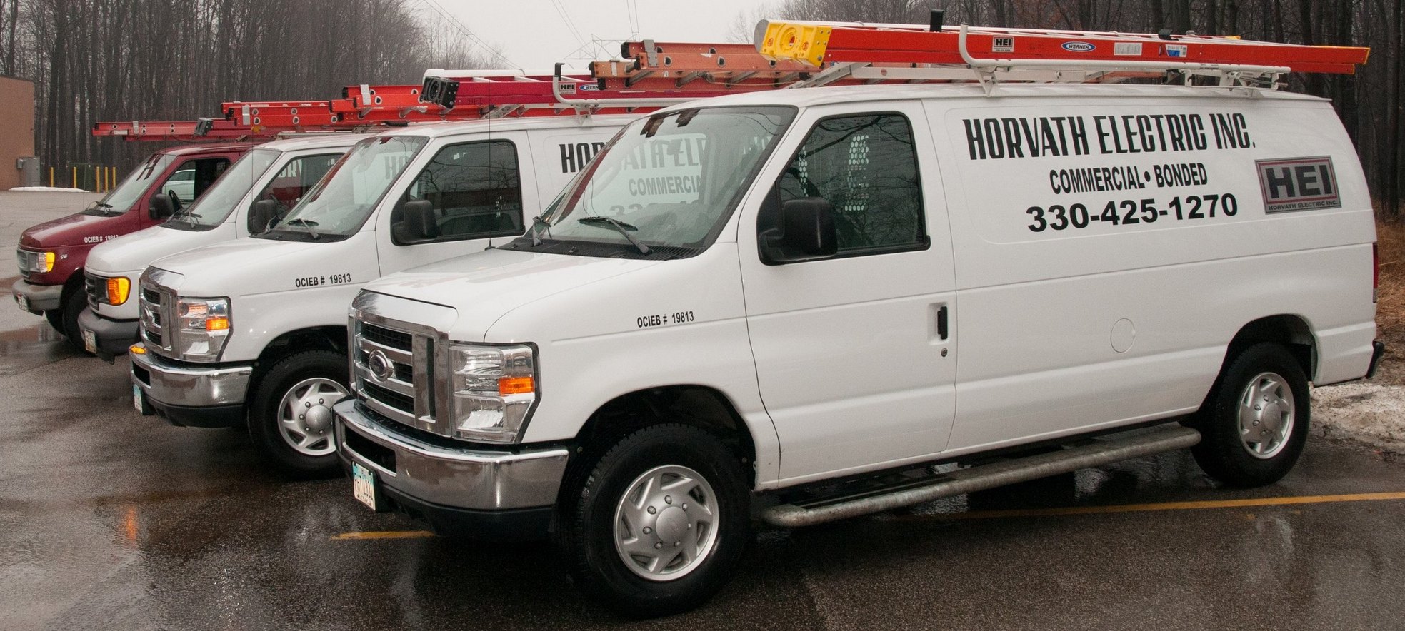 a photo of horvath electric's service vans